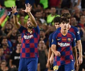 Luis Suárez fue figura en el duelo ante el Arsenal en el Joan Gamper. (AFP)