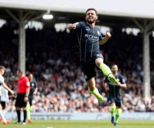 El atacante de Manchester City Bernardo Silva celebra tras anotar el primer gol del partido contra Fulham en la Liga Premier inglesa el sábado, 30 de marzo del 2019. City ganó 2-0. (AP Foto/Alastair Grant)