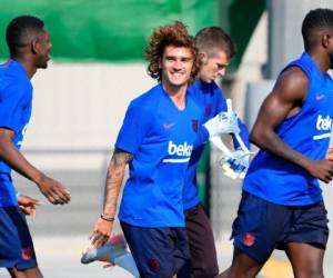 Así de contento se mostró Griezmann en el entrenamiento del FC Barcelona. (AFP)