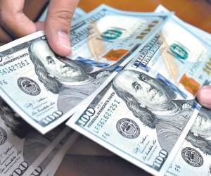 El tipo de cambio oficial sirve como referencia para las operaciones del mercado cambiario hondureño.