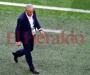 El seleccionador de la Verdeamarela celebró el primer gol de Brasil con una caída. Foto: Agencia AFP