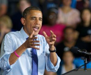 MOUNT VERNON, IA - OCTOBER 17: U.S. President Barrack Obama addresses a group at the Richard and Norma Small Multi-Sports Center Gym at Cornell College on October 17, 2012 in Mount Vernon, Iowa. President Obama visited the college campus in Iowa, a state that is still very much up for grabs, one day after the second Presidential Debate in order to highlight his plans for moving the country forward. David Greedy/Getty Images/AFP== FOR NEWSPAPERS, INTERNET, TELCOS & TELEVISION USE ONLY ==