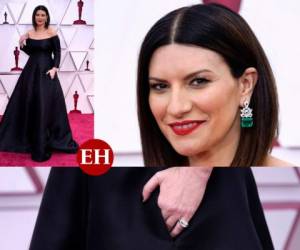 Laura Pausini es tendencia mundial por su nominación en los premios Oscar 2021. Para el evento eligió un elegante vestido negro de Valentino Couture. Fotos AFP