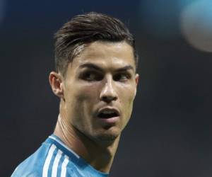 Cristiano Ronaldo disputa un encuentro de la Liga de Campeone (AP Foto/Bernat Armangue, archivo).