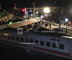 El brutal accidente provocó que muchas de las víctimas hallan muerto aplastadas. (Foto: AP)