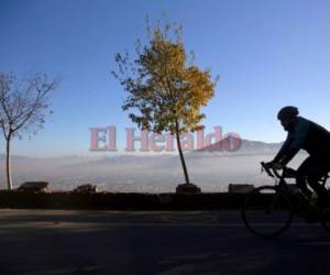 La mala calidad del aire es responsable indirecta de cerca de 3,700 muertes de chilenos al año. Foto AFP