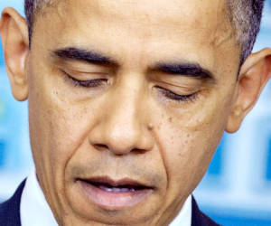 US President Barack Obama speaks during a previously unannounced appearance in the Brady Briefing Room of the White House on December 14, 2012 in Washington, DC. Obama spoke following the shooting in a Connecticut Elementary School which left at least 27 people dead. AFP PHOTO/Mandel NGAN