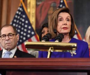 Los demócratas acusaron a Trump por cargos de abuso de poder y de obstrucción a la justicia. Foto: AFP