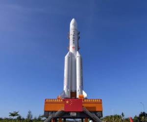 This photo taken on July 17, 2020 shows a Long March 5 rocket being transferred before a planned launch in Wenchang in China's southern Hainan province. - After sending humans into orbit and landing a probe on the Moon, China is aiming for another milestone in its space ambitions with the launch of a Mars rover between July 20 and 25. (Photo by STR / AFP) / China OUT