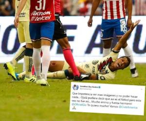 Giovani dos Santos, en el centro, hace una mueca de dolor después de una entrada del Antonio Briseño de Guadalajara durante un partido de la liga mexicana de fútbol en el estadio Azteca en México. Fotos. Agencia AP.