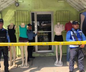 La pareja fue asesinada en el interior de la tienda de ropa en La Lima, Cortés.