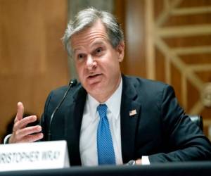 El director del FBI, Christopher Wray, testifica ante la Comisión de Asuntos Gubernamentales y Seguridad Nacional del Senado en una audiencia sobre las amenazas a la seguridad 20 años después de los ataques terroristas del 11 de septiembre de 2001, el martes 21 de septiembre de 2021, en Washington. (Greg Nash/Pool vía AP).