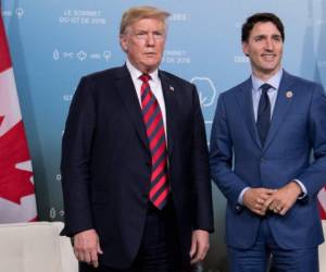 Donald Trump junto al primer ministro de Canadá, Justin Trudeau. (AFP)