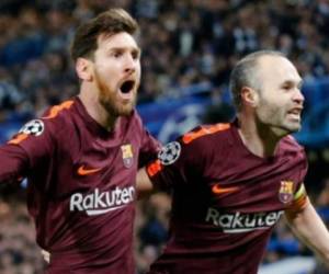 Messi e Iniesta celebran un gol. Foto AP