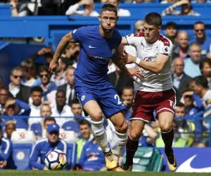 Chelsea's Belgian midfielder Charly Musonda celebrates scoring his team's third goal during the English League Cup third round football match between Chelsea and Nottingham Forest at Stamford Bridge in London on September 20, 2017. / AFP PHOTO / Glyn KIRK / RESTRICTED TO EDITORIAL USE. No use with unauthorized audio, video, data, fixture lists, club/league logos or 'live' services. Online in-match use limited to 75 images, no video emulation. No use in betting, games or single club/league/player publications. /