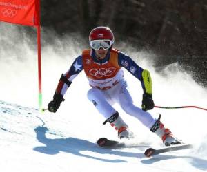 El puertorriqueño Charles Flaherty compite en el primer recorrido del eslalon gigante durante los Juegos Olímpicos de Invierno en Pyeongchang, Corea del Sur. Foto AP
