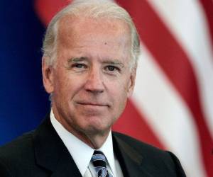 People celebrate on Black Lives Matter plaza across from the White House in Washington, DC, on November 7, 2020, after Joe Biden was declared the winner of the 2020 presidential election. - Democrat Joe Biden has won the White House, US media said November 7, defeating Donald Trump and ending a presidency that convulsed American politics, shocked the world and left the United States more divided than at any time in decades. (Photo by Eric BARADAT / AFP)