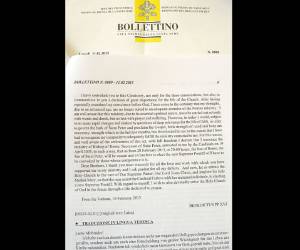 This picture shows a copy in English of the text in Latin read by Pope Benedict XVI earlier in the day announcing his resignation on February 11, 2013 at the Vatican. Pope Benedict XVI on February 11, 2013 announced he will resign on February 28, a Vatican spokesman told AFP, which will make him the first pope to do so in centuries. AFP PHOTO / ANDREAS SOLARO