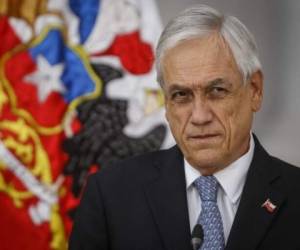 Piñera, quien fue notificado de su condición de contacto estrecho este martes, en la mañana realizó su última aparición pública. Foto: AFP