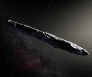 Esta imagen de archivo publicada por el Observatorio Europeo Austral el 20 de noviembre de 2017 muestra la impresión de un artista del primer asteroide interestelar, llamado Oumuamua.