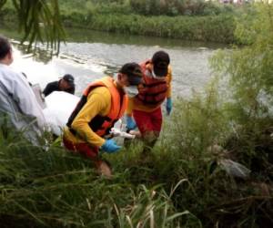La víctima de entre 50 a 60 años de edad fue encontrada flotando en el río Chamelecón.