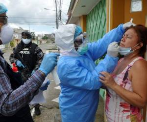 People wear face masks in Mexico City downtown, on August 3, 2020, amid the COVID-19 coronavirus pandemic. (Photo by PEDRO PARDO / AFP)