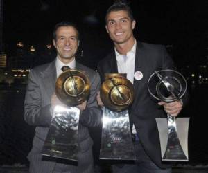 Jorge Mendes y Cristiano Ronaldo. (Fotos agencias: AFP)