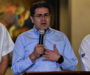 Juan Orlando Hernández, presidente de Honduras, durante una conferencia de prensa. Foto AFP