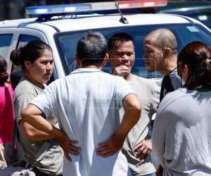 Escena del crimen en el barrio Las Flores, sector Barandillas de San Pedro Sula, donde fue asesinado un empresario de origen chino dentro de su negocio. El crimen ha causado conmoción en la comunidad asiática en el país.