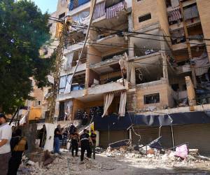 Los ataques lanzados por Israel este domingo contra los suburbios meridionales de Beirut, conocidos como el Dahye, causaron un número indeterminado de heridos, algunas muertes y dos edificios residenciales que fueron alcanzados por las bombas, pese a que el Ejército israelí afirmó que el objetivo era un cuartel general del grupo chií Hizbulá. Aquí las fotos:
