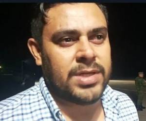 Ricardo Amador, familiar de joven fallecido, José Ángel Ceballos, de Choluteca, con los ojos llenos de lágrimas se recostó en el féretro y expresó a EL HERALDO que era doloroso ese momento