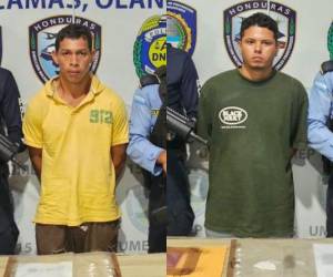 Marco Tulio Ramos Erazo y Juan Ramón Santos Erazo, al ser detenidos por la Policía, en el barrio La Cruz, de Catacamas.