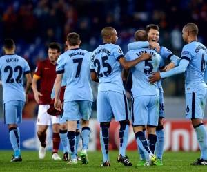 Los jugadores del Manchester City celebran el triunfo ante la Roma de Italia.