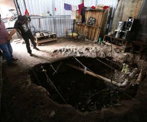 Socavón en taller del barrio Buenos Aires sigue creciendo tras un año sin respuesta de la Alcaldía, pese al riesgo que representa.