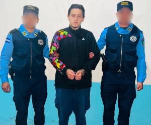 Miguel Ángel Andino Escalante al ser aprehendido por agentes policiales.