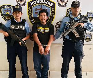 Santos Magdiel Santos Gutiérrez, tras ser detenidos por agentes de la DPI y de la Dirección Nacional de Seguridad Comunitaria.