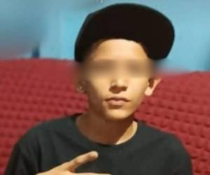 Agentes de la DPI durante allanamientos en San Pedro Sula donde capturaron a sospechosos del asesinato del menor conocido como Carita.