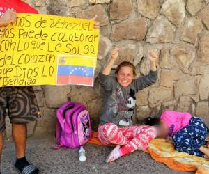 “Felices porque vamos a volver a estar con nuestra familia después de tantos años”, señaló esta familia venezolana de paso por Tegucigalpa.