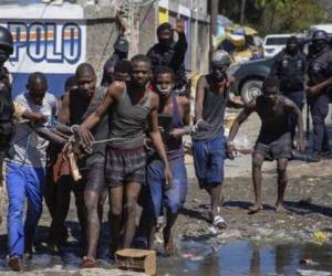 El gobierno haitiano denunció el “desenfreno de criminales fuertemente armados que quieren a toda costa liberar a personas detenidas en Haití.