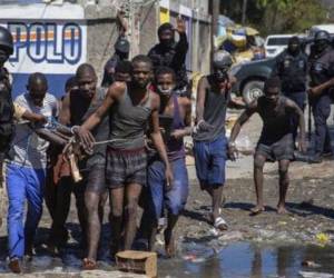 El gobierno haitiano denunció el “desenfreno de criminales fuertemente armados que quieren a toda costa liberar a personas detenidas en Haití.