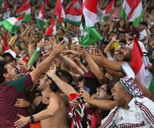 Fernando Diniz y Germán Cano de Fluminense fueron reconocidos como el mejor entrenador y el mejor jugador de toda América