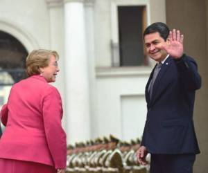 El presidente de Honduras viaja esta noche de Chile a Perú. (Foto: AFP)
