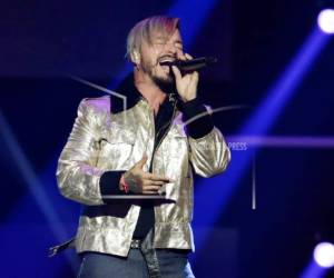 En esta foto del 27 de abril del 2017, J Balvin canta en la ceremonia de los Premios Billboard de la Música en Coral Gables, Florida.