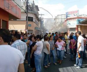 Los comercios permanecían cerrados en los mercados de Comayagüela a causa de la protesta.