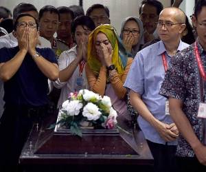 era víctima del accidente del avión de AirAsia fue inhumada hoy.