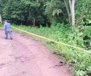 La zona donde se encontrarían los cuerpos fue acordonada por la Policía de Honduras.