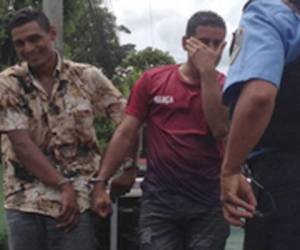 Los dos hombres fueron detenidos luego que asaltaran una unidad de transporte en San Pedro Sula.