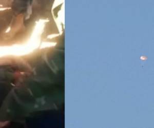 Video‬ difundido en la red muestra cómo un grupo de rebeldes rodea el cuerpo del piloto ruso del Su-24 derribado por Turquía