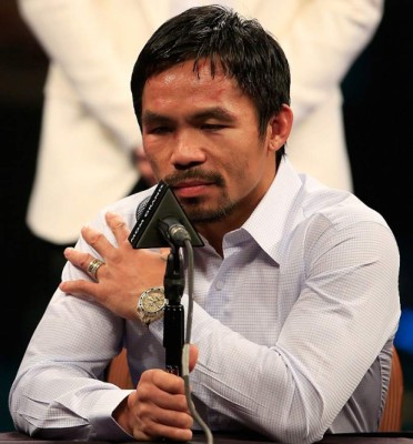 Pacquiao dice que lesión en el hombro le afectó en la pelea