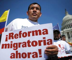 WASHINGTON, DC - APRIL 10: Italo Salinas of Danbury, Connecticut, gathers with other immigration activists on the West Lawn of the U.S. Capitol for an All In for Citizenship rally April 10, 2013 on Capitol Hill in Washington, DC. Tens of thousands of reform supporters gathered for the rally to call on Congress to act on proposals that would grant a path to citizenship for an estimated 11 million of the nation's illegal immigrants. Alex Wong/Getty Images/AFP== FOR NEWSPAPERS, INTERNET, TELCOS & TELEVISION USE ONLY ==